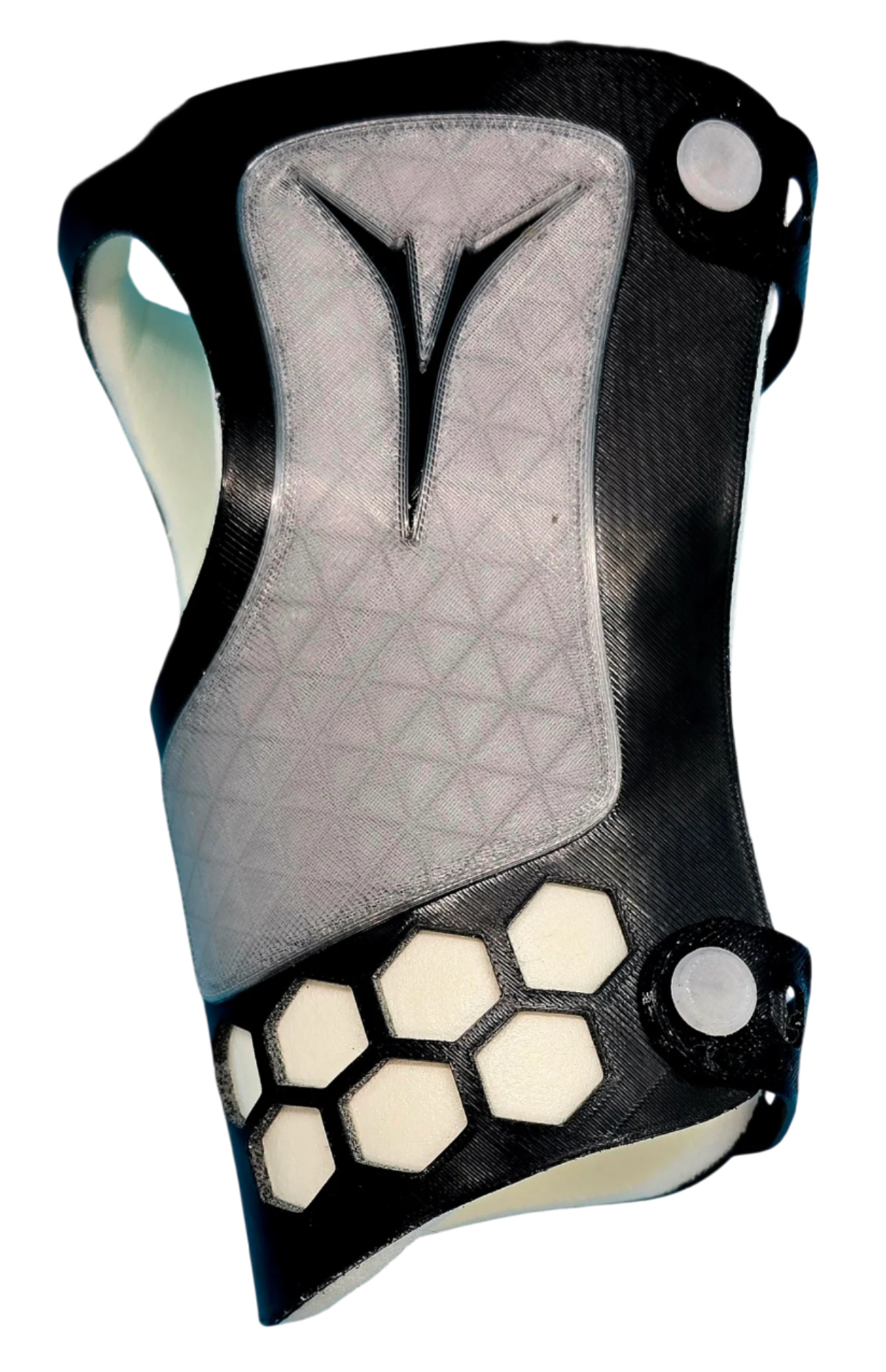 Image of the back in full view of the YouFORM Pads custom wrist guard in black and white